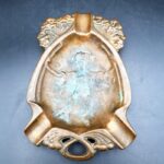 Antique Art Nouveau figural ashtray or vide poche with female figure and floral decoration