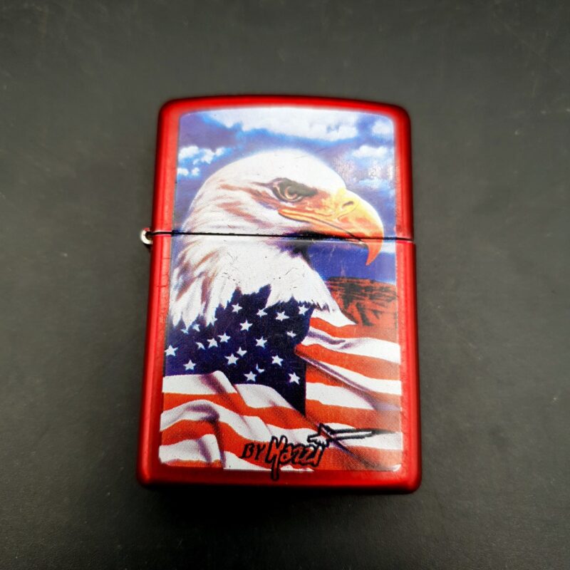 Red Zippo Mazzi Freedom Watch lighter dated A 09 2009 with decorative front design