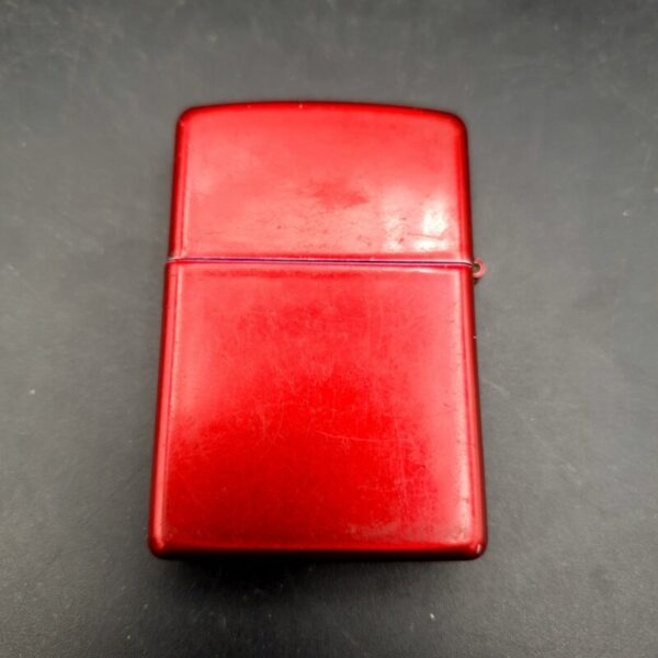 Red Zippo Mazzi Freedom Watch lighter dated A 09 2009 with decorative front design