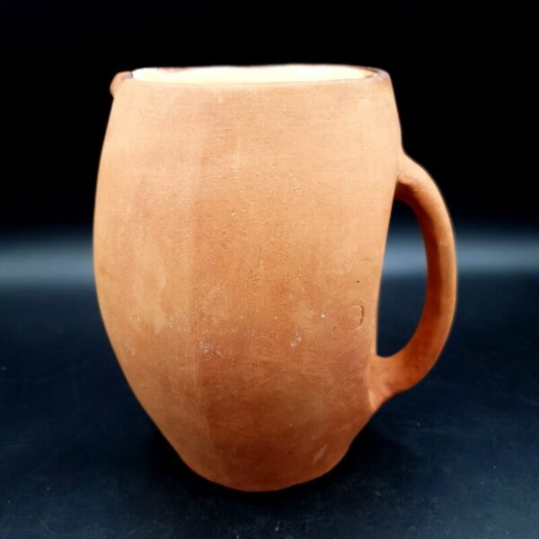 Antique C.H. Brannam Barum Ware unglazed terracotta jug with incised mark, Devon, c.1890