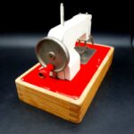 Vintage 1960s Müller Regina Model 730/2 battery-operated toy sewing machine