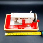 Vintage 1960s Müller Regina Model 730/2 battery-operated toy sewing machine