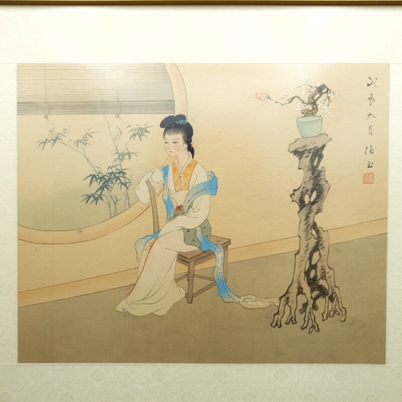 Vintage Chinese hand-painted silk artwork depicting a lady with blossoms and inscription in a floral-bordered frame