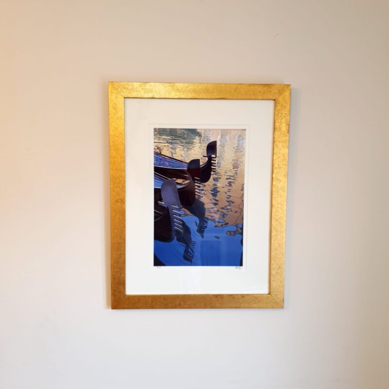 Signed limited-edition photographic print of three gondolas numbered 3 of 10 in a distressed gold-tone frame