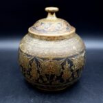 Antique Indian brass lidded jar with hand-engraved geometric floral decoration in Benares style