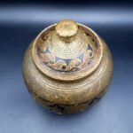 Antique Indian brass lidded jar with hand-engraved geometric floral decoration in Benares style