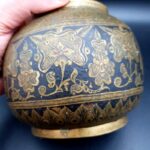 Antique Indian brass lidded jar with hand-engraved geometric floral decoration in Benares style