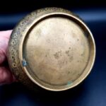 Antique Indian brass lidded jar with hand-engraved geometric floral decoration in Benares style