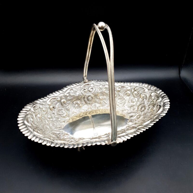 Antique JGS silver-plated bride’s basket with swing handle and floral scroll decoration