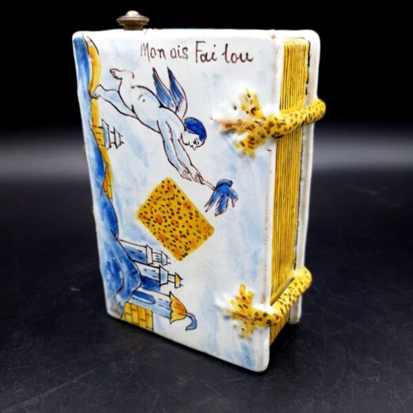 Antique French faience book-form hand warmer with hand-painted bird and floral decoration