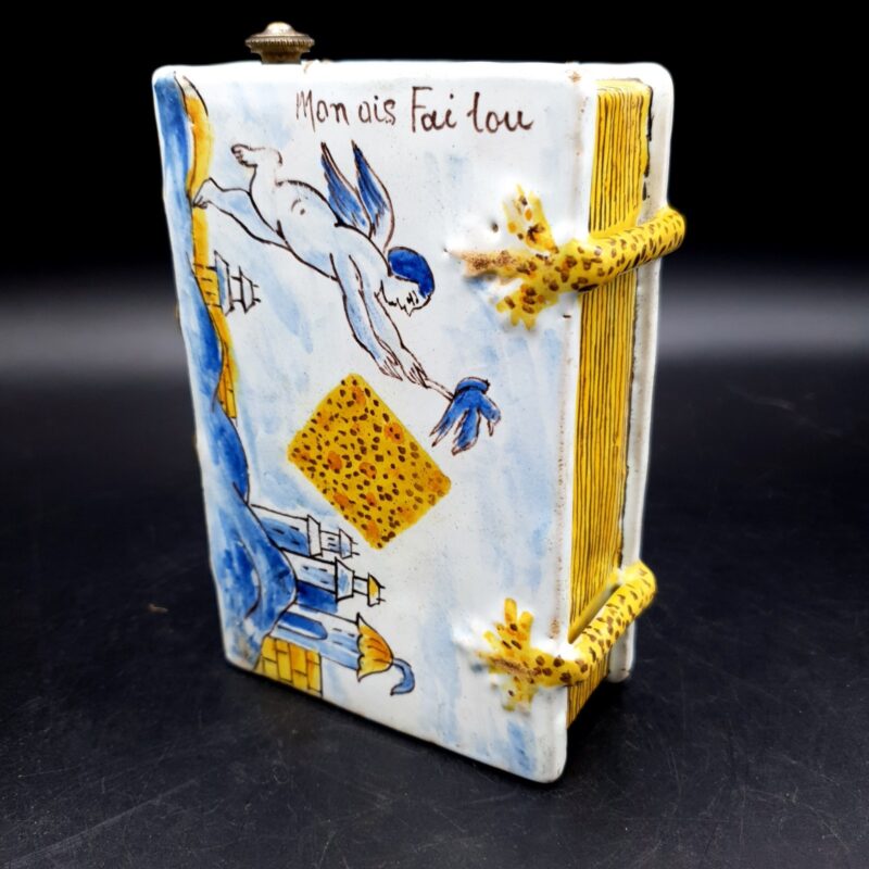 Antique French faience book-form hand warmer with hand-painted bird and floral decoration