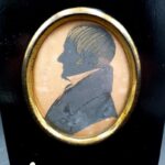 Antique 19th-century ink profile portrait of a gentleman in Regency-style dress