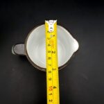 Vintage Denby Romance stoneware milk jug with floral decoration and green border
