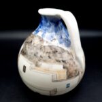Vintage Greek pottery jug with hand-painted Mediterranean street scene