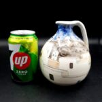 Vintage Greek pottery jug with hand-painted Mediterranean street scene