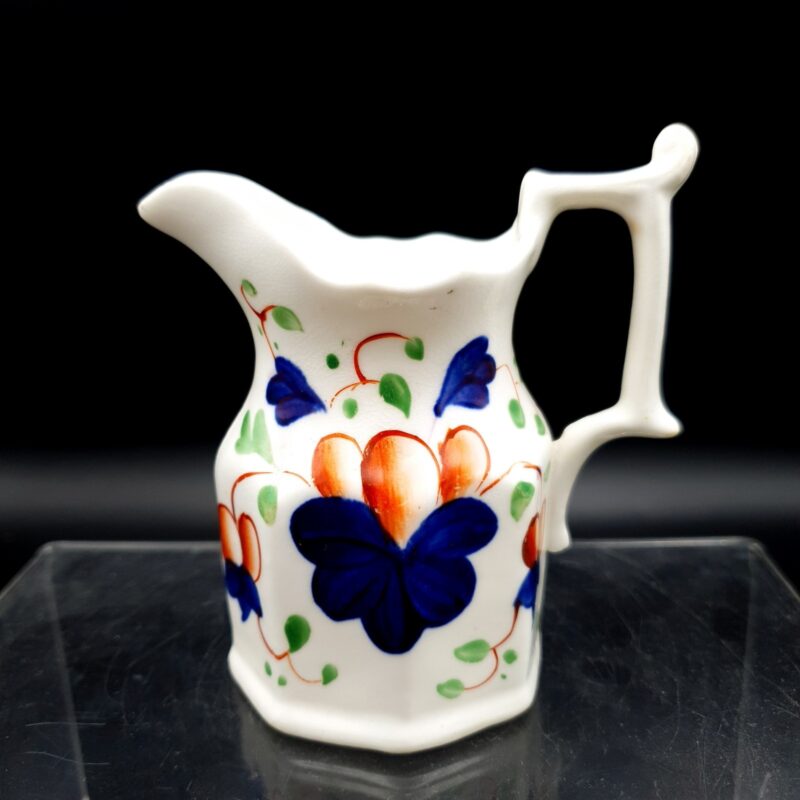 Antique English Imari-style cream jug with hand-painted floral decoration