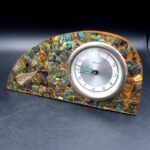 Vintage New Zealand pāua shell mantel clock with silver-coloured NZ fern