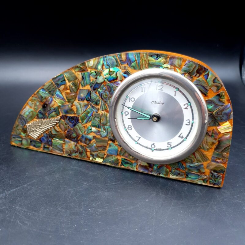 Vintage New Zealand pāua shell mantel clock with silver-coloured NZ fern