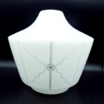 White moulded glass light shade with repeating textured geometric panels