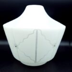 Side view of vintage geometric white glass ceiling shade