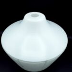 Vintage white glass ceiling shade showing moulded textured design