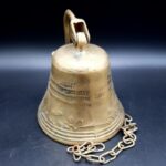 Vintage Brass Pull Bell with chain and wall attachment Bell is 9cm tall 690g