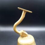 Vintage Brass Pull Bell with chain and wall attachment Bell is 9cm tall 690g