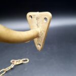 Vintage Brass Pull Bell with chain and wall attachment Bell is 9cm tall 690g