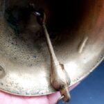 Vintage Brass Pull Bell with chain and wall attachment Bell is 9cm tall 690g