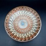 Top view of vintage West German pottery bowl in warm brown tones