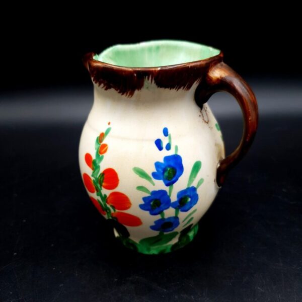 Art Deco Hancock’s Ivory Ware jug with colourful floral decoration