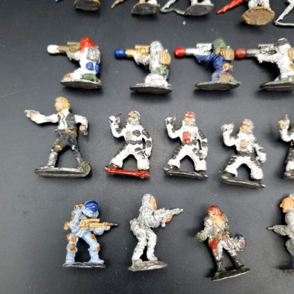 Group of approximately 80 metal sci-fi miniature figures and four vehicles