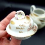 Kaga Kutani-yaki Teapot & sugar bowl with crane motifs moriage gilt C1920-30s